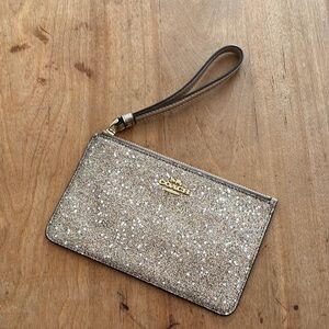 Gold glitter coach wristlet